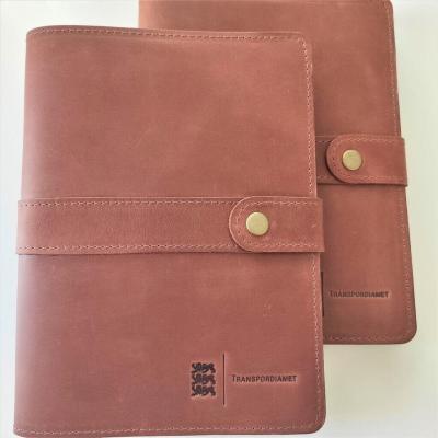 enjoythewoodestonia pressitud logoga nahast märkmikud Transpordiametile